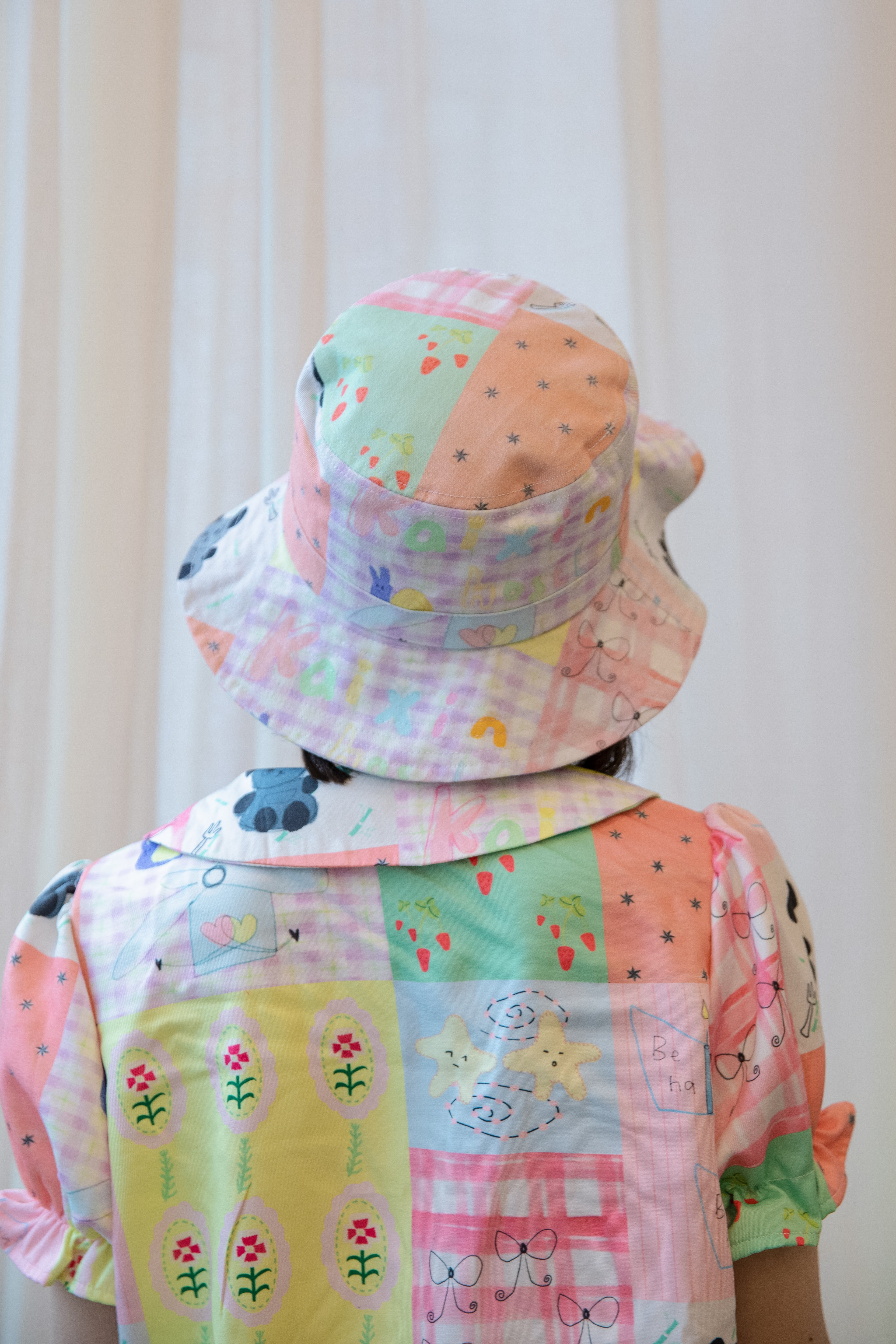 Kaixin Hostel Illustration Wide Brim Bucket Hat